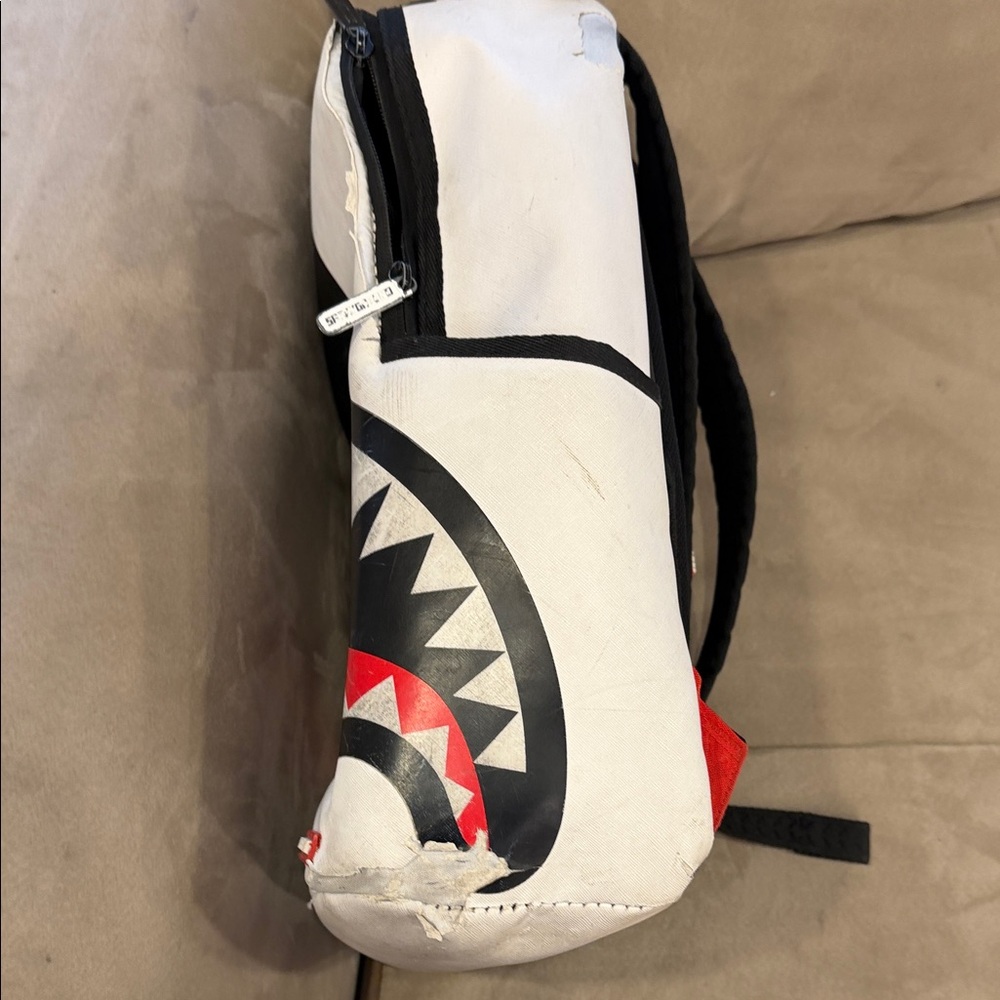 Sprayground Black and White Shark Backpack with Red Accents - Picture 3 of 7